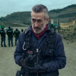 Marco Giallini vestito da poliziotto per la serie Netflix ACAB