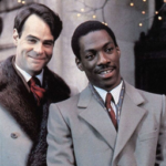 Gil attori, da sinistra verso destra, Dan Aykroyd ed Eddie Murphy nel film Una Poltrona per due.